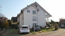 Exterieur *** Solide vermietet + viel Potenzial: 3,5-Zi.-Wohnung mit Terrasse & Gartenanteil ***